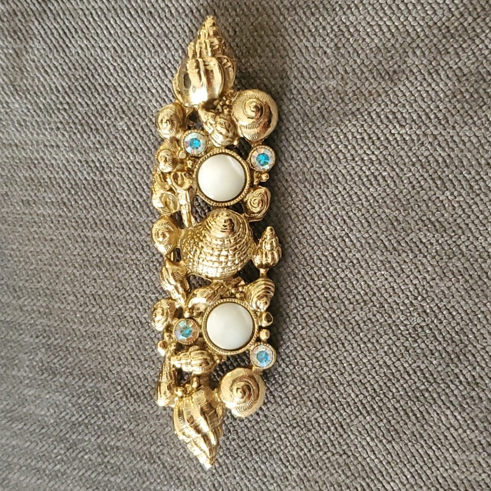 Vintage Goldtone with Faux Stones and seashells.